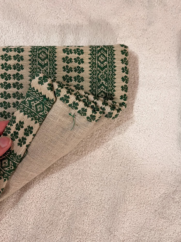 tacking roman shade folds